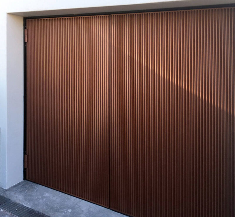 Outswing doors Axolotl copper Doric pattern